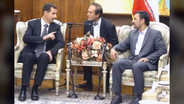 الأسد ونجاد يعلنان تعزيز محور طهران – دمشق