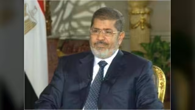أسامة نجل مرسي يتحدث عن تفاصيل زيارة والده لسجن برج العرب